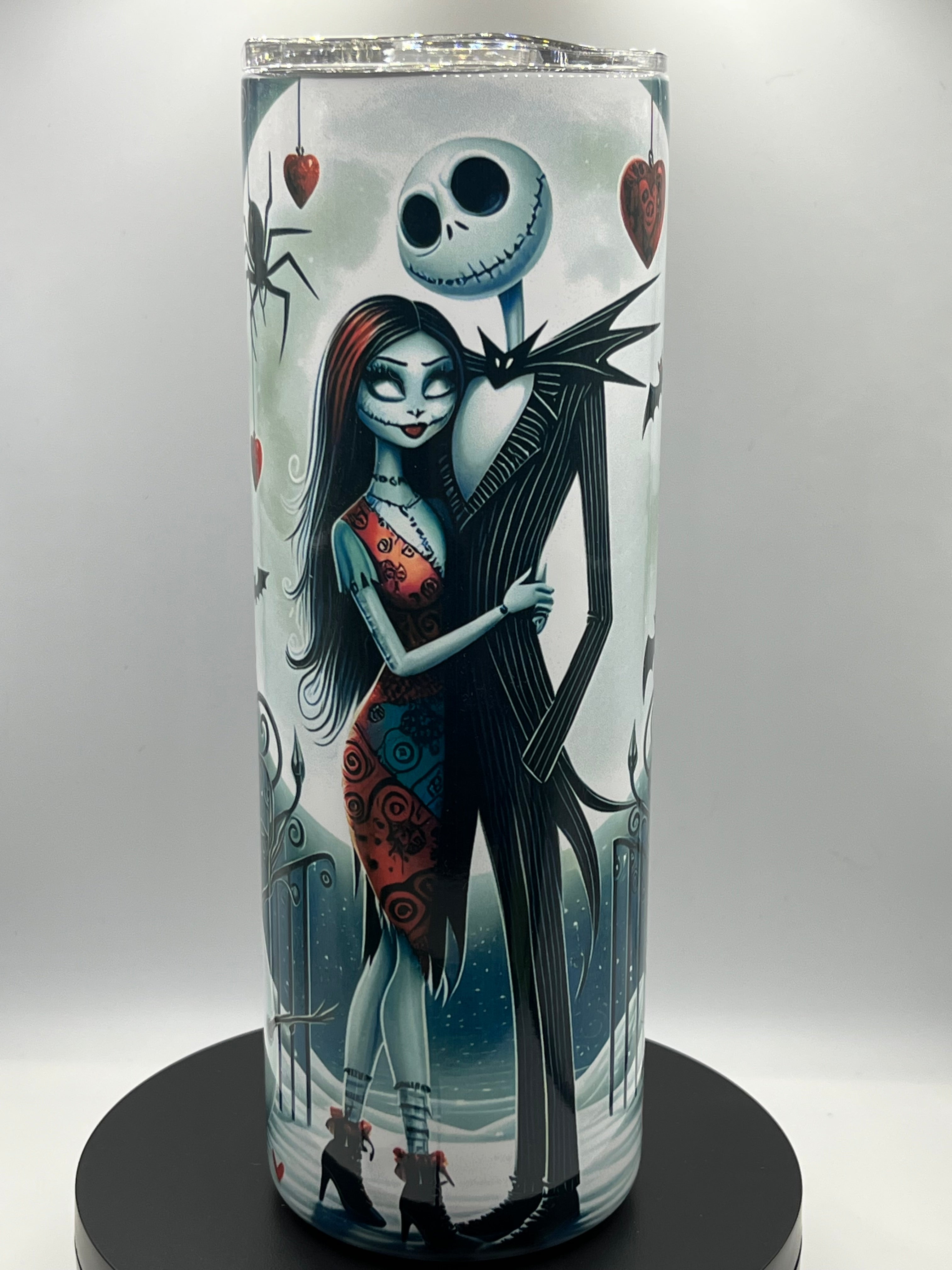 20oz Tumblers-Stainless steel with a lid and a metal straw.